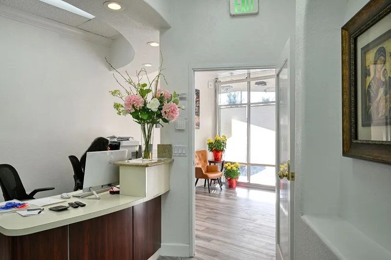 Office front desk and door to reception area